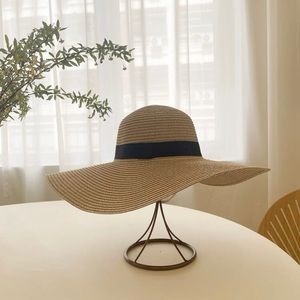 Gently worn Khaki Bogo Straw Sun Hat 22.8” inner circumference.